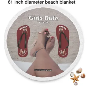 Girls TOEtally Rule round beach with a tiny man between your toes