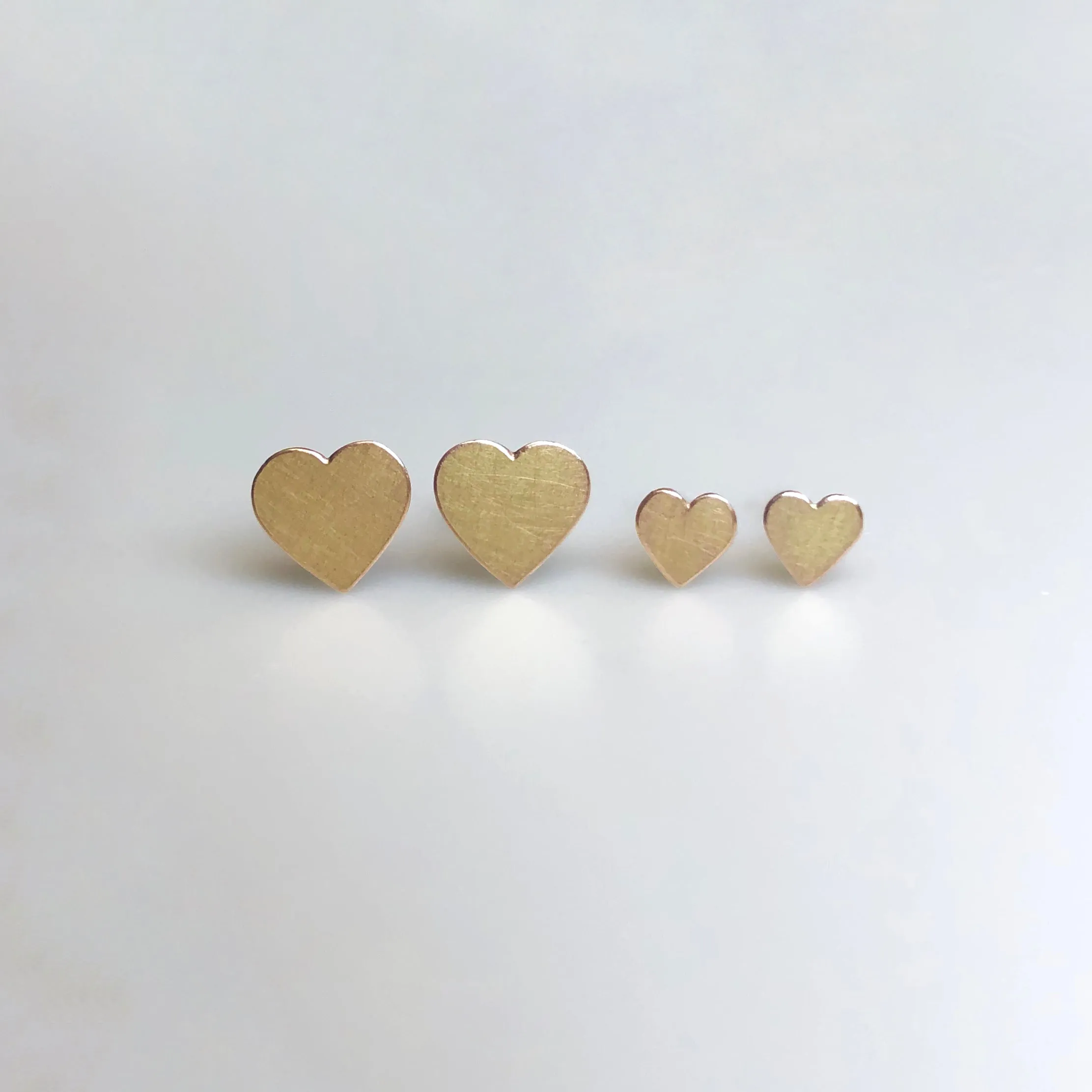 Heart stud earrings in reclaimed 14k gold, medium